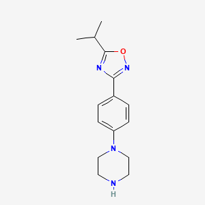 molecular formula C15H20N4O B7876360 5-Isopropyl-3-(4-piperazinophenyl)-1,2,4-oxadiazole 