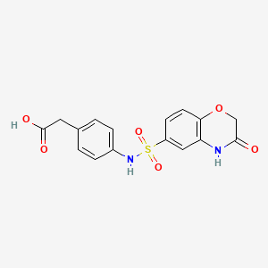 molecular formula C16H14N2O6S B7877019 (4-{[(3-oxo-3,4-dihydro-2H-1,4-benzoxazin-6-yl)sulfonyl]amino}phenyl)acetic acid 