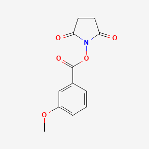 1-[(3-Methoxybenzoyl)oxy]pyrrolidine-2,5-dione