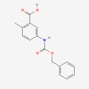 molecular formula C16H15NO4 B7892724 5-(((Benzyloxy)carbonyl)amino)-2-methylbenzoic acid 