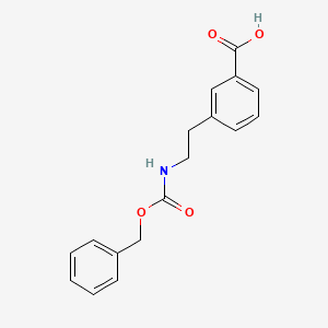molecular formula C17H17NO4 B7894701 3-(2-{[(Benzyloxy)carbonyl]amino}ethyl)benzoic acid 