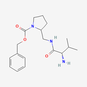 molecular formula C18H27N3O3 B7920116 2-[((S)-2-Amino-3-methyl-butyrylamino)-methyl]-pyrrolidine-1-carboxylic acid benzyl ester 