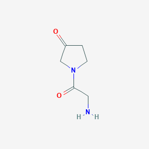 molecular formula C6H10N2O2 B7921074 1-(2-Amino-acetyl)-pyrrolidin-3-one 