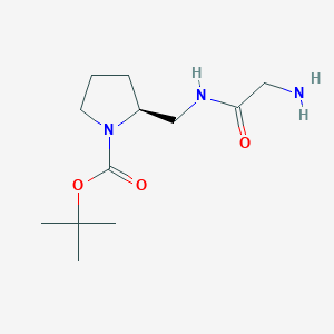 molecular formula C12H23N3O3 B7921278 (S)-2-[(2-Amino-acetylamino)-methyl]-pyrrolidine-1-carboxylic acid tert-butyl ester 