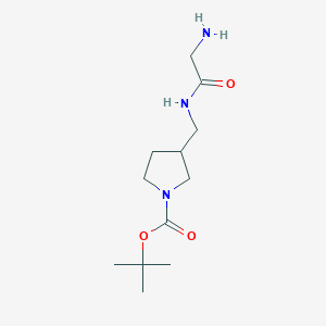 molecular formula C12H23N3O3 B7921304 3-[(2-Amino-acetylamino)-methyl]-pyrrolidine-1-carboxylic acid tert-butyl ester 