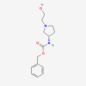molecular formula C14H20N2O3 B7924052 [(S)-1-(2-Hydroxy-ethyl)-pyrrolidin-3-yl]-carbamic acid benzyl ester 