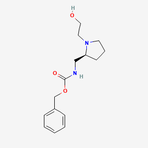 molecular formula C15H22N2O3 B7924061 [(S)-1-(2-Hydroxy-ethyl)-pyrrolidin-2-ylmethyl]-carbamic acid benzyl ester 