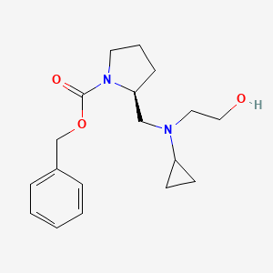 molecular formula C18H26N2O3 B7924792 (S)-2-{[Cyclopropyl-(2-hydroxy-ethyl)-amino]-methyl}-pyrrolidine-1-carboxylic acid benzyl ester 