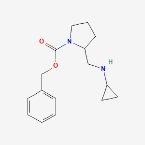 molecular formula C16H22N2O2 B7924874 2-Cyclopropylaminomethyl-pyrrolidine-1-carboxylic acid benzyl ester 