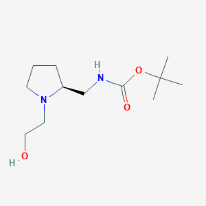 molecular formula C12H24N2O3 B7930375 [(S)-1-(2-Hydroxy-ethyl)-pyrrolidin-2-ylmethyl]-carbamic acid tert-butyl ester 