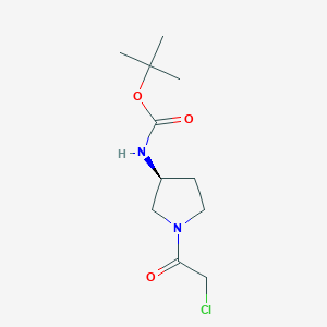 molecular formula C11H19ClN2O3 B7930583 [(S)-1-(2-Chloro-acetyl)-pyrrolidin-3-yl]-carbamic acid tert-butyl ester 