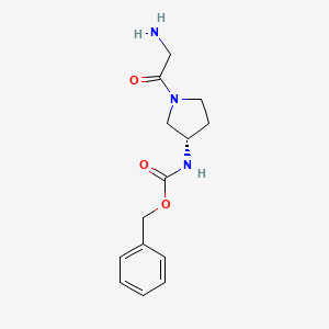 molecular formula C14H19N3O3 B7930984 [(S)-1-(2-Amino-acetyl)-pyrrolidin-3-yl]-carbamic acid benzyl ester 