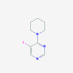 molecular formula C9H12IN3 B7940374 5-Iodo-4-(piperidin-1-yl)pyrimidine 