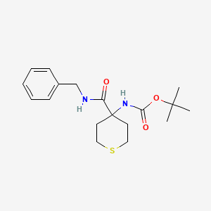 molecular formula C18H26N2O3S B7944244 tert-butyl N-[4-(benzylcarbamoyl)thian-4-yl]carbamate 