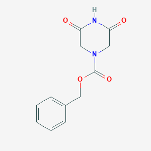 molecular formula C12H12N2O4 B7944422 3,5-Dioxopiperazine-1-carboxylic acid benzyl ester 