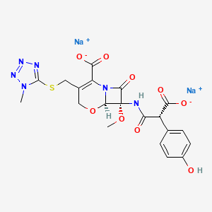 disodium;(6R,7R)-7-[[(2R)-2-carboxylato-2-(4-hydroxyphenyl)acetyl]amino]-7-methoxy-3-[(1-methyltetrazol-5-yl)sulfanylmethyl]-8-oxo-5-oxa-1-azabicyclo[4.2.0]oct-2-ene-2-carboxylate