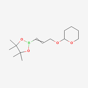 2-{[3-(4,4,5,5-Tetramethyl-1,3,2-dioxaborolan-2-yl)prop-2-en-1-yl]oxy}oxane