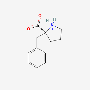 molecular formula C12H15NO2 B7950171 (2S)-2-benzylpyrrolidin-1-ium-2-carboxylate 