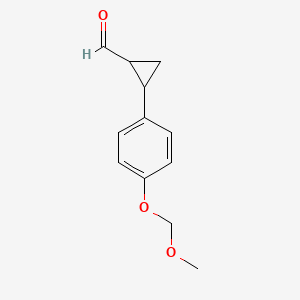 molecular formula C12H14O3 B7951310 2-[4-(Methoxymethoxy)phenyl]cyclopropane-1-carbaldehyde 