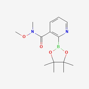 molecular formula C14H21BN2O4 B7953293 N-Methoxy-N-methyl-2-(tetramethyl-1,3,2-dioxaborolan-2-yl)pyridine-3-carboxamide 