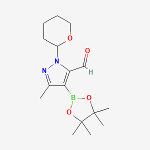 5-Methyl-2-(oxan-2-yl)-4-(tetramethyl-1,3,2-dioxaborolan-2-yl)pyrazole-3-carbaldehyde