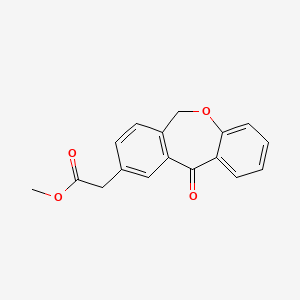 molecular formula C17H14O4 B7959353 Methyl 2-{2-oxo-9-oxatricyclo[9.4.0.0^{3,8}]pentadeca-1(11),3,5,7,12,14-hexaen-14-yl}acetate CAS No. 1820687-28-2