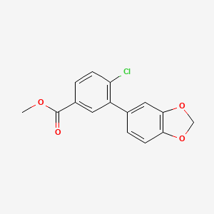 molecular formula C15H11ClO4 B7959876 Methyl 3-(2H-1,3-benzodioxol-5-YL)-4-chlorobenzoate 