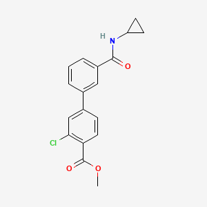 molecular formula C18H16ClNO3 B7962648 Methyl 2-chloro-4-[3-(cyclopropylcarbamoyl)phenyl]benzoate 
