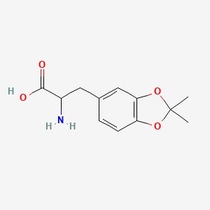 molecular formula C12H15NO4 B7965484 2-Amino-3-(2,2-dimethyl-benzo[1,3]dioxol-5-yl)-propionic acid 