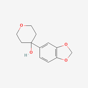 molecular formula C12H14O4 B7965739 4-(1,3-Benzodioxol-5-yl)oxan-4-ol 