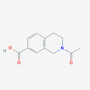 molecular formula C12H13NO3 B7974105 2-Acetyl-1,2,3,4-tetrahydroisoquinoline-7-carboxylic acid 