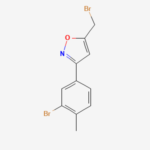 molecular formula C11H9Br2NO B7976118 5-(Bromomethyl)-3-(3-bromo-4-methylphenyl)-1,2-oxazole 