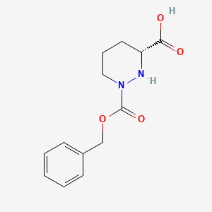 molecular formula C13H16N2O4 B7980624 (R)-1-((Benzyloxy)carbonyl)hexahydropyridazine-3-carboxylic acid 