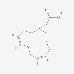 molecular formula C14H20O2 B7980671 (4Z,8Z)-bicyclo[10.1.0]trideca-4,8-diene-13-carboxylic acid 