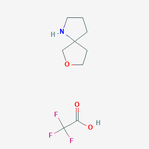 molecular formula C9H14F3NO3 B7980773 7-Oxa-1-azaspiro[4.4]nonane 2,2,2-trifluoroacetate 