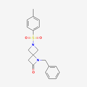 1-Benzyl-6-tosyl-1,6-diazaspiro[3.3]heptan-2-one