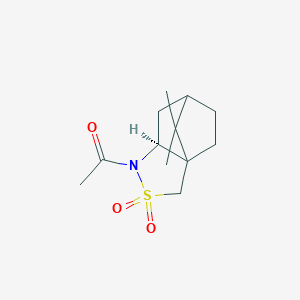 molecular formula C12H19NO3S B7983862 1-[(5S)-10,10-dimethyl-3,3-dioxo-3lambda6-thia-4-azatricyclo[5.2.1.01,5]decan-4-yl]ethanone 
