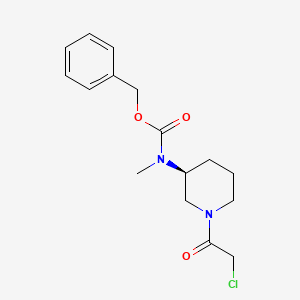 molecular formula C16H21ClN2O3 B7985057 [(S)-1-(2-Chloro-acetyl)-piperidin-3-yl]-methyl-carbamic acid benzyl ester 