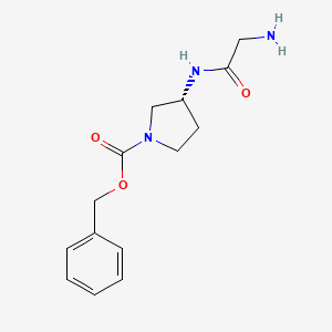 molecular formula C14H19N3O3 B7986044 (R)-3-(2-Amino-acetylamino)-pyrrolidine-1-carboxylic acid benzyl ester 