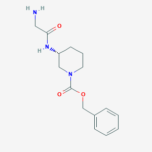 molecular formula C15H21N3O3 B7986052 (R)-3-(2-Amino-acetylamino)-piperidine-1-carboxylic acid benzyl ester 