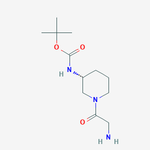 molecular formula C12H23N3O3 B7986728 [(R)-1-(2-Amino-acetyl)-piperidin-3-yl]-carbamic acid tert-butyl ester 