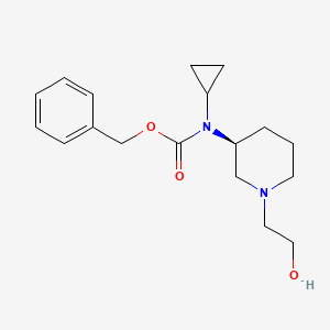 molecular formula C18H26N2O3 B7986781 Cyclopropyl-[(S)-1-(2-hydroxy-ethyl)-piperidin-3-yl]-carbamic acid benzyl ester 