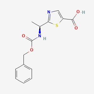 molecular formula C14H14N2O4S B7989473 (S)-2-(1-(((Benzyloxy)carbonyl)amino)ethyl)thiazole-5-carboxylic acid 
