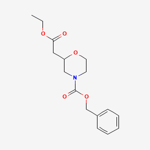 molecular formula C16H21NO5 B7989557 Benzyl 2-((ethoxycarbonyl)methyl)morpholine-4-carboxylate 