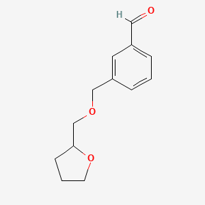molecular formula C13H16O3 B7991859 3-(((Tetrahydrofuran-2-yl)methoxy)methyl)benzaldehyde 