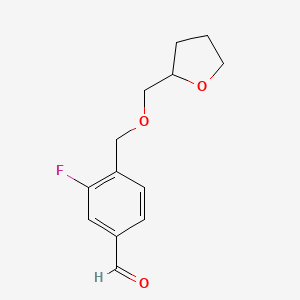 molecular formula C13H15FO3 B7994590 3-Fluoro-4-(((tetrahydrofuran-2-yl)methoxy)methyl)benzaldehyde 