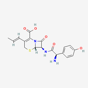 molecular formula C18H19N3O5S B8005588 (6S,7R)-7-((R)-2-Amino-2-(4-hydroxyphenyl)acetamido)-8-oxo-3-((E)-prop-1-en-1-yl)-5-thia-1-azabicyclo[4.2.0]oct-2-ene-2-carboxylic acid 