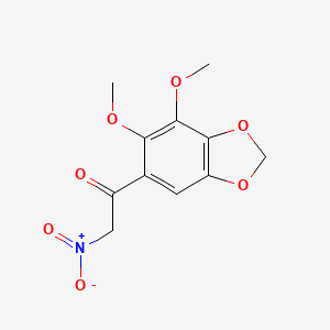 molecular formula C11H11NO7 B8006490 1-(6,7-Dimethoxy-1,3-benzodioxol-5-yl)-2-nitroethanone 