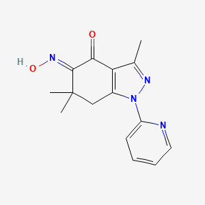 molecular formula C15H16N4O2 B8006555 (5E)-5-hydroxyimino-3,6,6-trimethyl-1-pyridin-2-yl-7H-indazol-4-one 