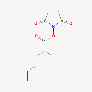 molecular formula C11H17NO4 B8007318 2,5-Dioxopyrrolidin-1-yl 2-methylhexanoate 